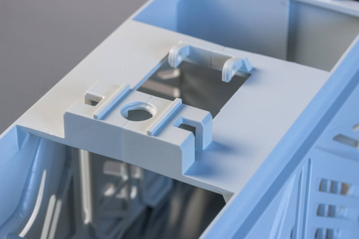 Plastic part consisting of two halves